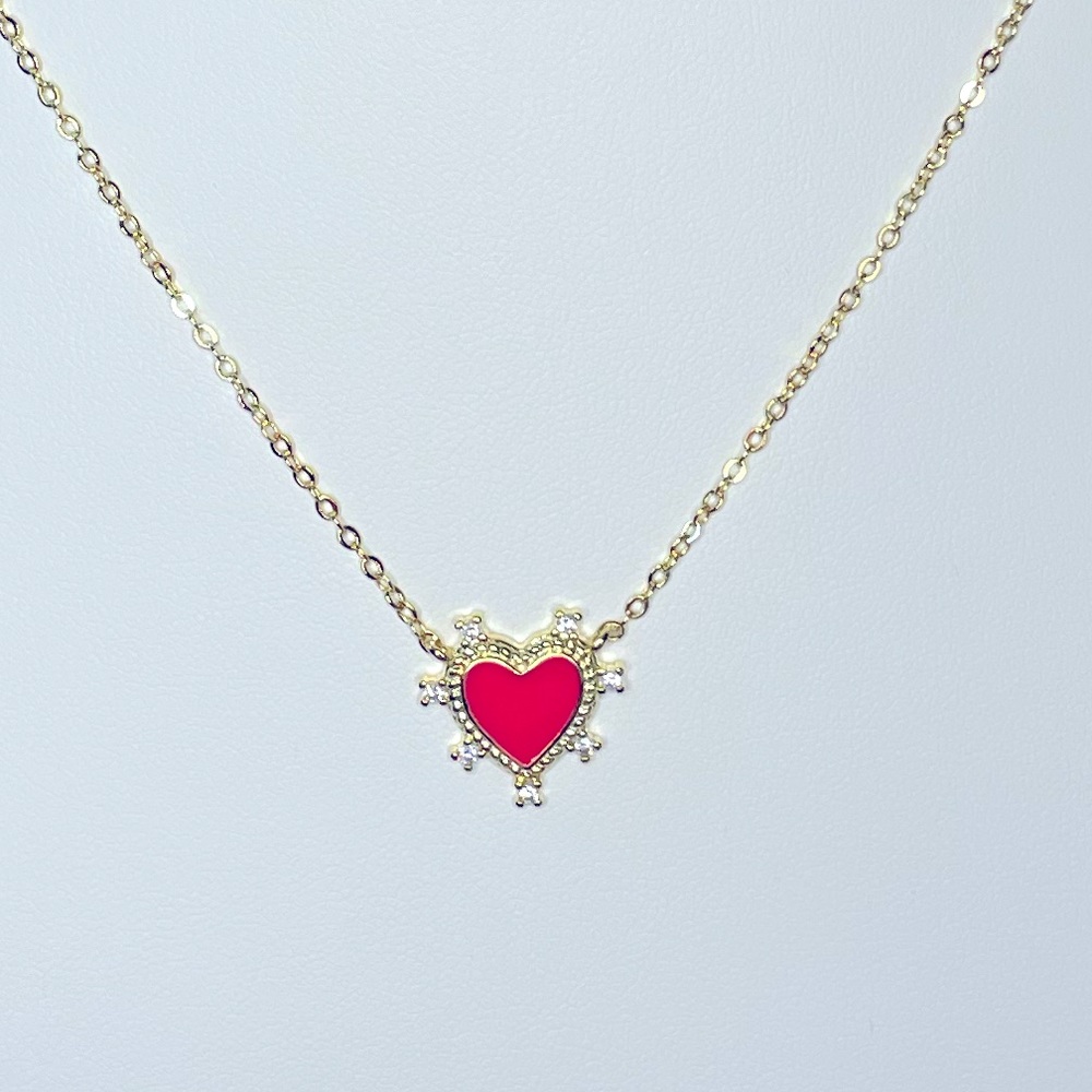 Gold chain with heart charm